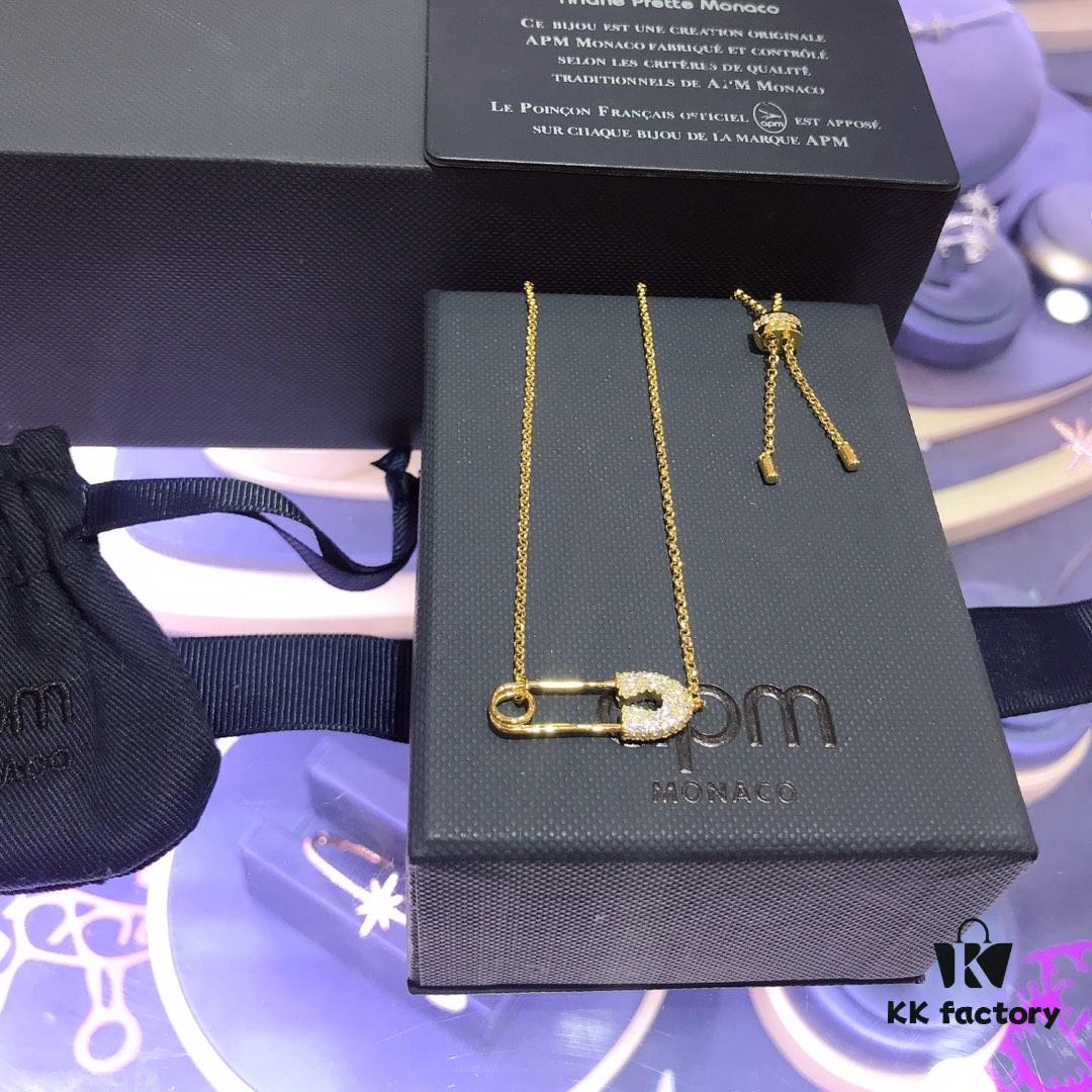 692feb8099f2d84055c8ccd3 APM Monaco Gold-Tone Pin Necklace and Bracelet Set