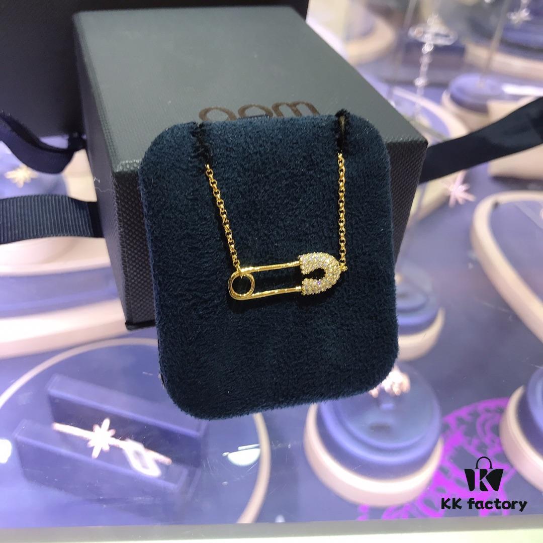 692feb8099f2d84055c8ccd4 APM Monaco Gold-Tone Pin Necklace and Bracelet Set