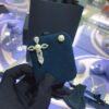 692febaf99f2d84055c8cd19 APM Monaco Asymmetrical Cross Pearl Stud Earrings