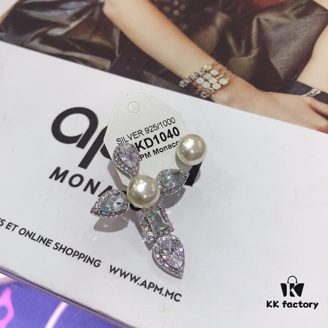 692febb299f2d84055c8cd1b APM Monaco Asymmetrical Cross Pearl Stud Earrings
