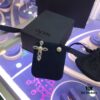 692febb499f2d84055c8cd1f APM Monaco Asymmetrical Cross Pearl Stud Earrings