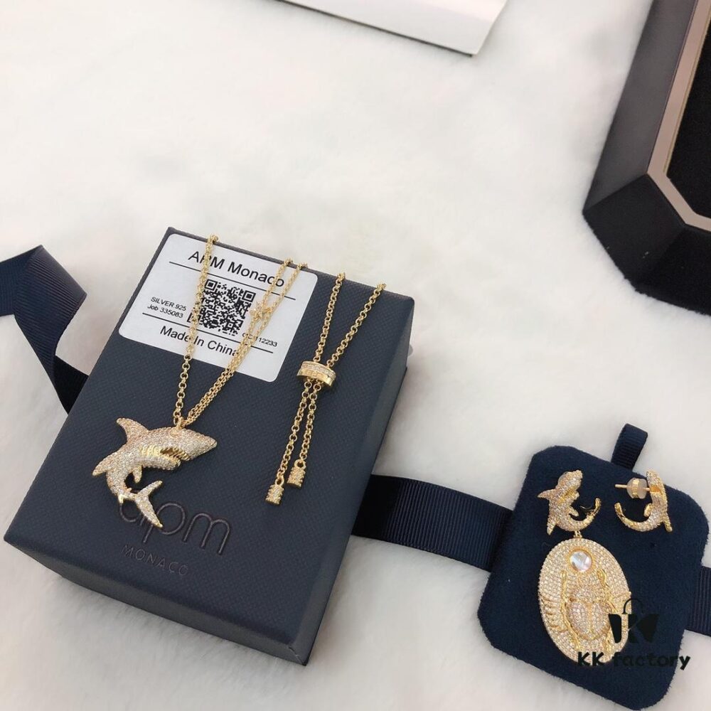 692febc399f2d84055c8cd37 APM Monaco European and American New Arrival for Autumn and Winter - Stylish Ins Influencer and Celebrity Shark Pendant Sweater Chain Set