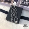 692febe399f2d84055c8cd68 APM Monaco Asymmetrical Interlocking Circle Pearl Long Tassel Earrings for Women