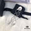 692febe499f2d84055c8cd69 APM Monaco Asymmetrical Interlocking Circle Pearl Long Tassel Earrings for Women