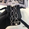 692febe599f2d84055c8cd6b APM Monaco Asymmetrical Interlocking Circle Pearl Long Tassel Earrings for Women