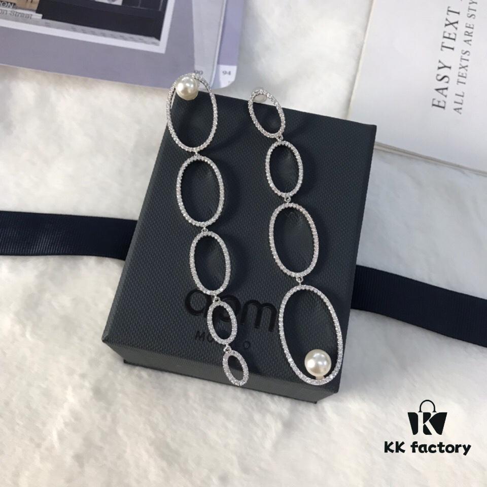 692febe699f2d84055c8cd6e APM Monaco Asymmetrical Interlocking Circle Pearl Long Tassel Earrings for Women