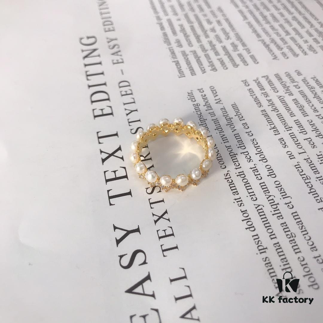 692febfd99f2d84055c8cd8a APM Monaco Pearl Wave Ring, Vintage-Inspired Fashion Statement, Trendy and Versatile Jewelry for Women