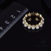 692fec1299f2d84055c8cdb4 APM Monaco Pearl Wave Ring, Vintage-Inspired Fashion Statement, Trendy and Versatile Jewelry for Women