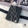 APM Monaco Asymmetrical Interlocking Circle Pearl Long Tassel Earrings for Women