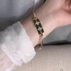 APM Monaco Gold-Tone Diamond-Paved Star Bracelet, New Arrival Unique Double Shooting Star Bangle