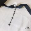 692feca999f2d84055c8cefb APM Monaco Asymmetric Long Shooting Star Earrings, Stylish and Minimalist Design for Women