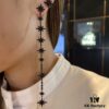 692feca999f2d84055c8cefd APM Monaco Asymmetric Long Shooting Star Earrings, Stylish and Minimalist Design for Women