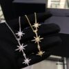 692fed8a99f2d84055c8d0be APM Monaco Hexagram Necklace with Crystals, Triple and Double Shooting Stars Pendant, Delicate Collarbone Chain, Elegant and Minimalist Design, Versatile and Stylish
