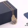 692fed9799f2d84055c8d0da APM Monaco Diamond-Encrusted Lucky Hand Necklace, Fashionable and Unique Pendant for Sweaters, Collarbone Chain