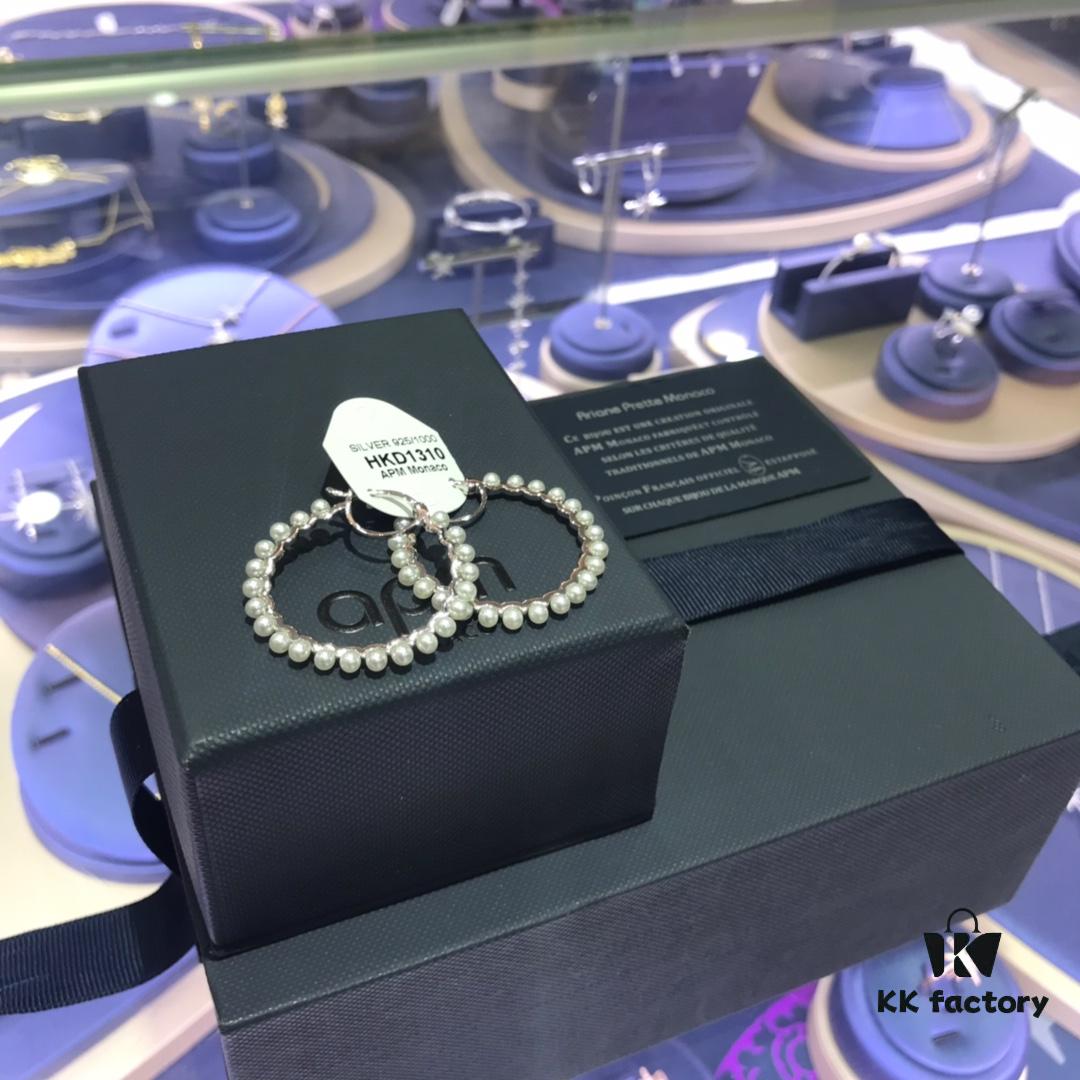 692fedad99f2d84055c8d0ff APM Monaco Pearl Hoop Earrings, Minimalist Fairy-like Style, Unique and Versatile Design