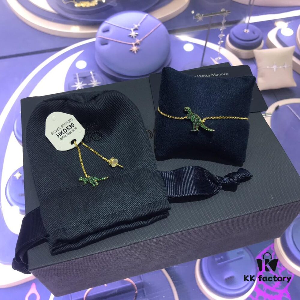 692fedca99f2d84055c8d134 APM Monaco Dinosaur Bracelet and Stud Earrings, Stylish Minimalist Design, Fashionable and Versatile