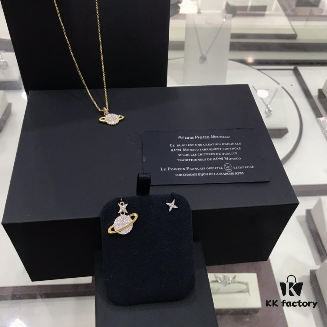 692fee0399f2d84055c8d1ac APM Monaco Cosmic Collection Saturn Planet Gold-Tone Stud Earrings and Necklace with Rhinestones, Stylish and Versatile