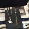 692fee0599f2d84055c8d1b0 APM Monaco Cosmic Collection Saturn Planet Gold-Tone Stud Earrings and Necklace with Rhinestones, Stylish and Versatile