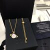 692fee0599f2d84055c8d1b1 APM Monaco Cosmic Collection Saturn Planet Gold-Tone Stud Earrings and Necklace with Rhinestones, Stylish and Versatile