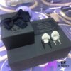 692fee1399f2d84055c8d1cd APM Monaco Stylish Crystal-Embedded Dragon Bone Ear Studs Y-Shaped Pendant Earrings for Women
