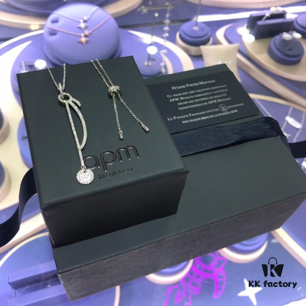 692fee3499f2d84055c8d1fc APM Monaco Necklace - Unique Exaggerated Pendant for Sweaters, Fashionable and Stylish Design