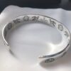 692fee8a99f2d84055c8d29f Gucci Blind for Love Collection 925 Sterling Silver Bracelet with Floral, Bird, Tiger Head, Eye and Heart Motifs