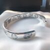 692fee9899f2d84055c8d2b8 Gucci Blind for Love Collection 925 Sterling Silver Bracelet with Floral, Bird, Tiger Head, Eye and Heart Motifs
