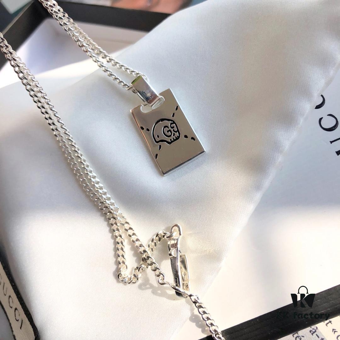 692feeca99f2d84055c8d30a Gucci Double G Skull Necklace