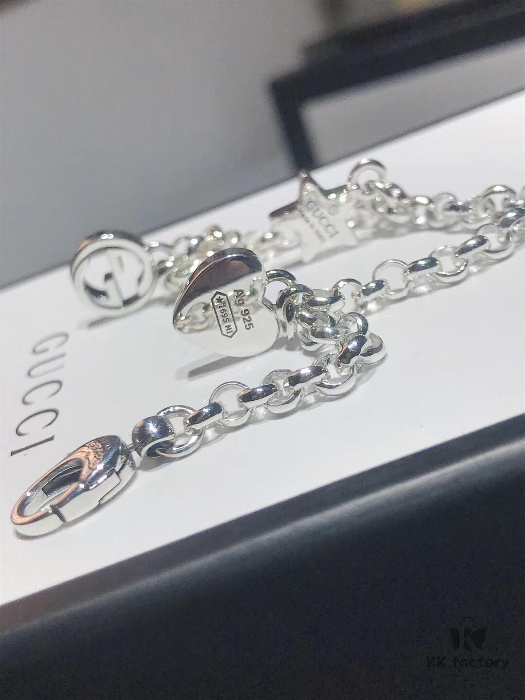 692feee899f2d84055c8d334 Gucci Tassel Double G Bracelet
