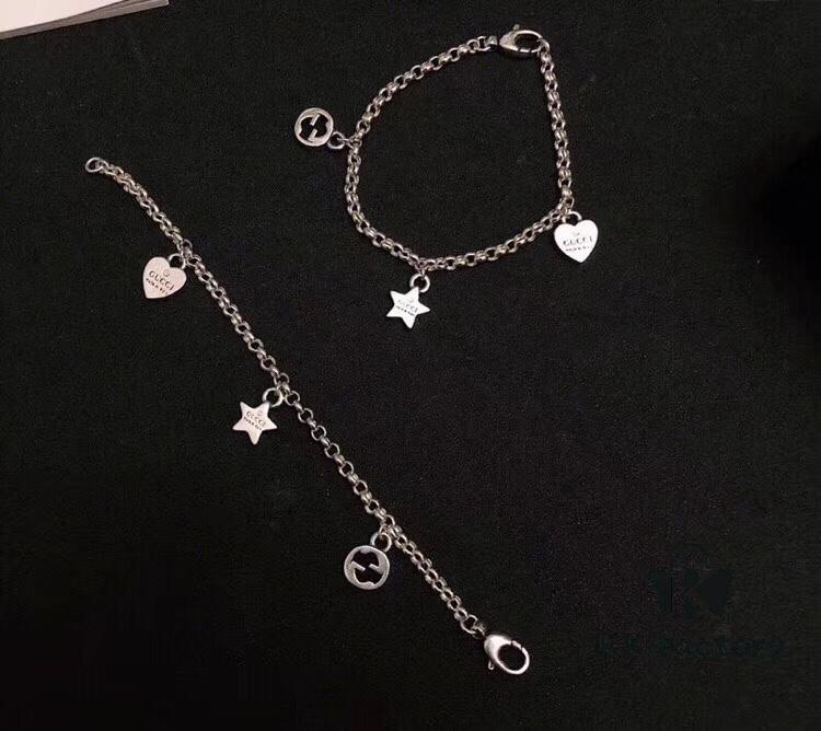 692feeea99f2d84055c8d338 Gucci Tassel Double G Bracelet