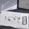 692feeea99f2d84055c8d33a Gucci Tassel Double G Bracelet