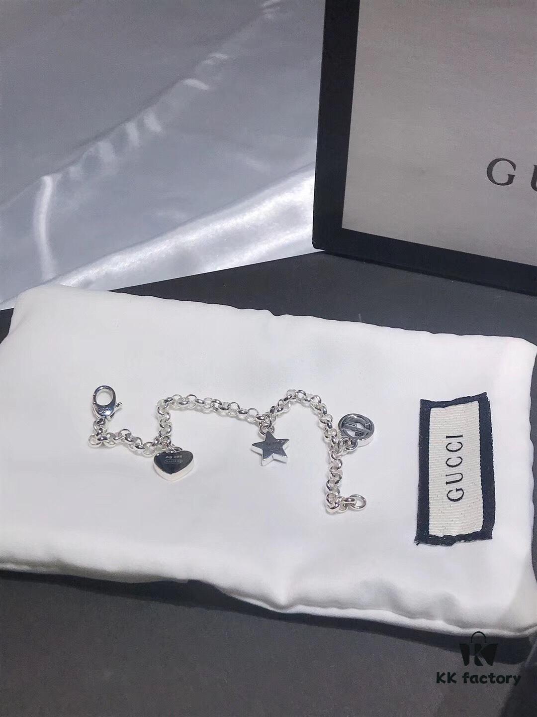 692feeea99f2d84055c8d33a Gucci Tassel Double G Bracelet