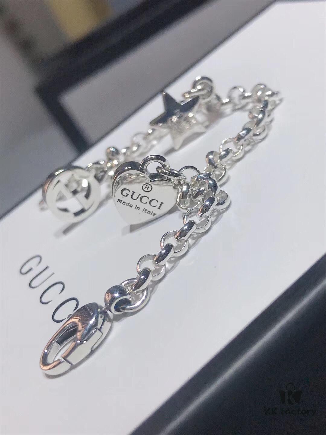 692feef199f2d84055c8d345 Gucci Tassel Double G Bracelet