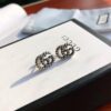 692fef0299f2d84055c8d362 New Arrival Sterling Silver Stud Earrings Featuring Interlocking GG Motif on Twisted Ribbon Design