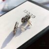 692fef0399f2d84055c8d365 New Arrival Sterling Silver Stud Earrings Featuring Interlocking GG Motif on Twisted Ribbon Design