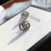 692fef0399f2d84055c8d367 New Arrival Sterling Silver Stud Earrings Featuring Interlocking GG Motif on Twisted Ribbon Design