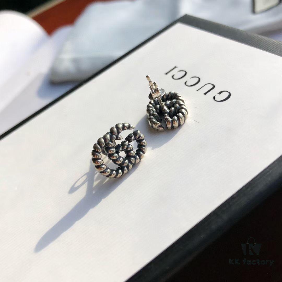 692fef0599f2d84055c8d369 New Arrival Sterling Silver Stud Earrings Featuring Interlocking GG Motif on Twisted Ribbon Design