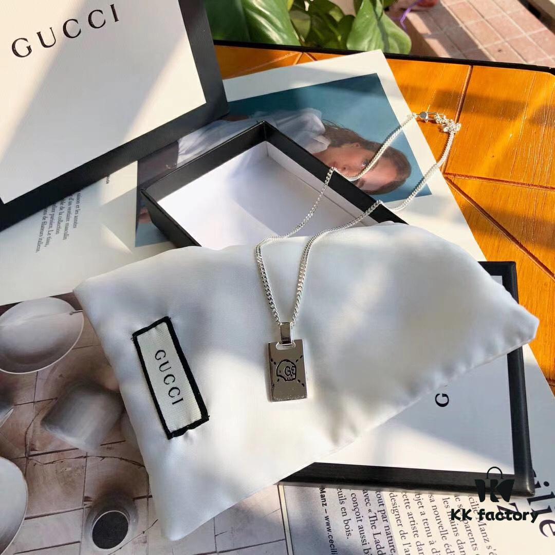 692fef1b99f2d84055c8d394 Gucci Double G Skull Necklace