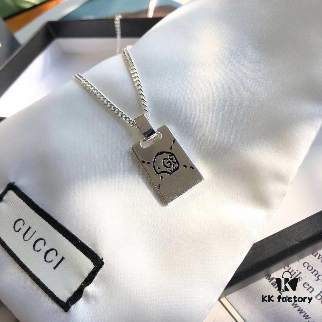 692fef1b99f2d84055c8d395 Gucci Double G Skull Necklace