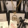 692fef3299f2d84055c8d3bb GUCCI Diamond-Paved Double G Set Necklace and Stud Earrings
