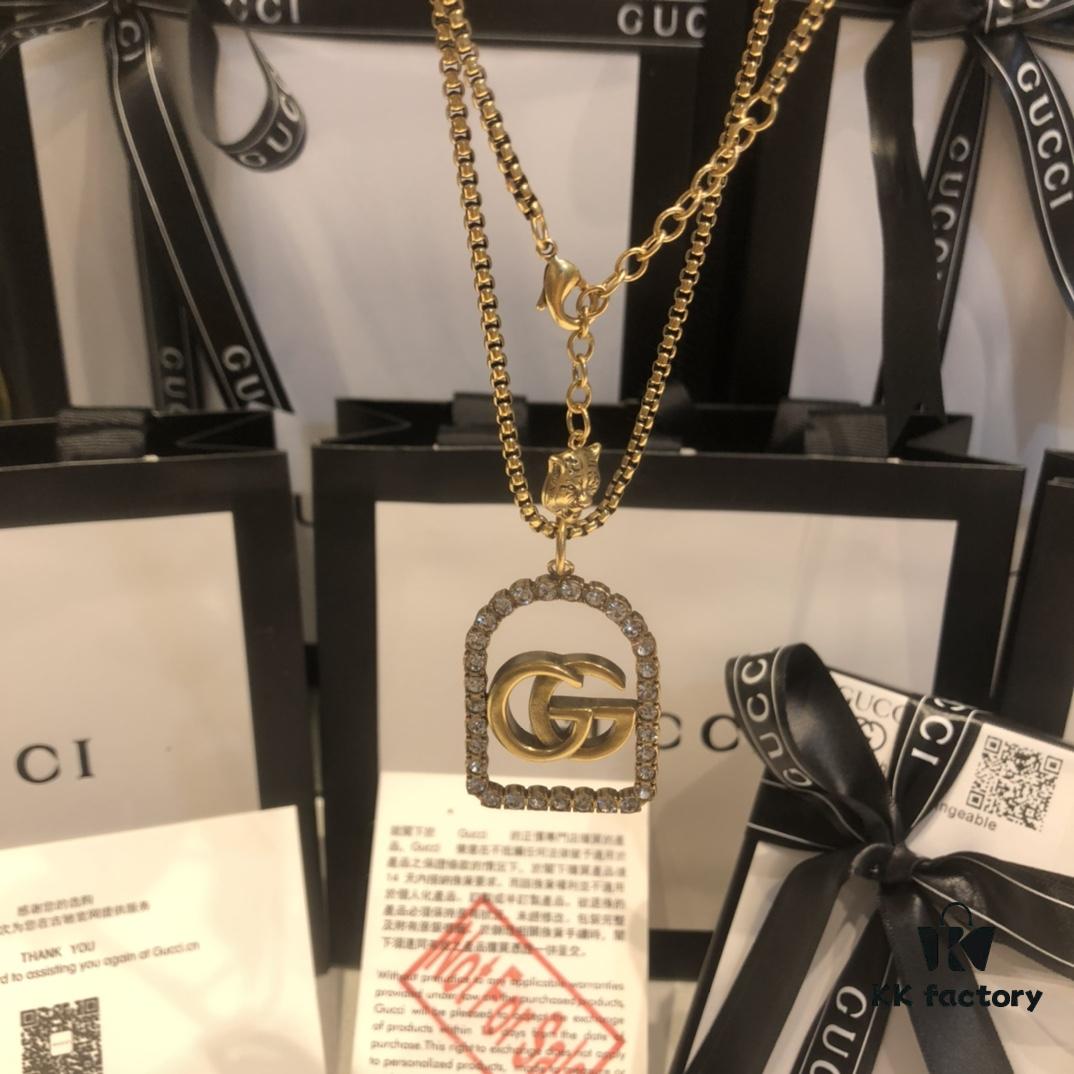 692fef3299f2d84055c8d3bb GUCCI Diamond-Paved Double G Set Necklace and Stud Earrings