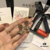 692fef3799f2d84055c8d3c1 GUCCI Diamond-Paved Double G Pearl Bee Stud Earrings