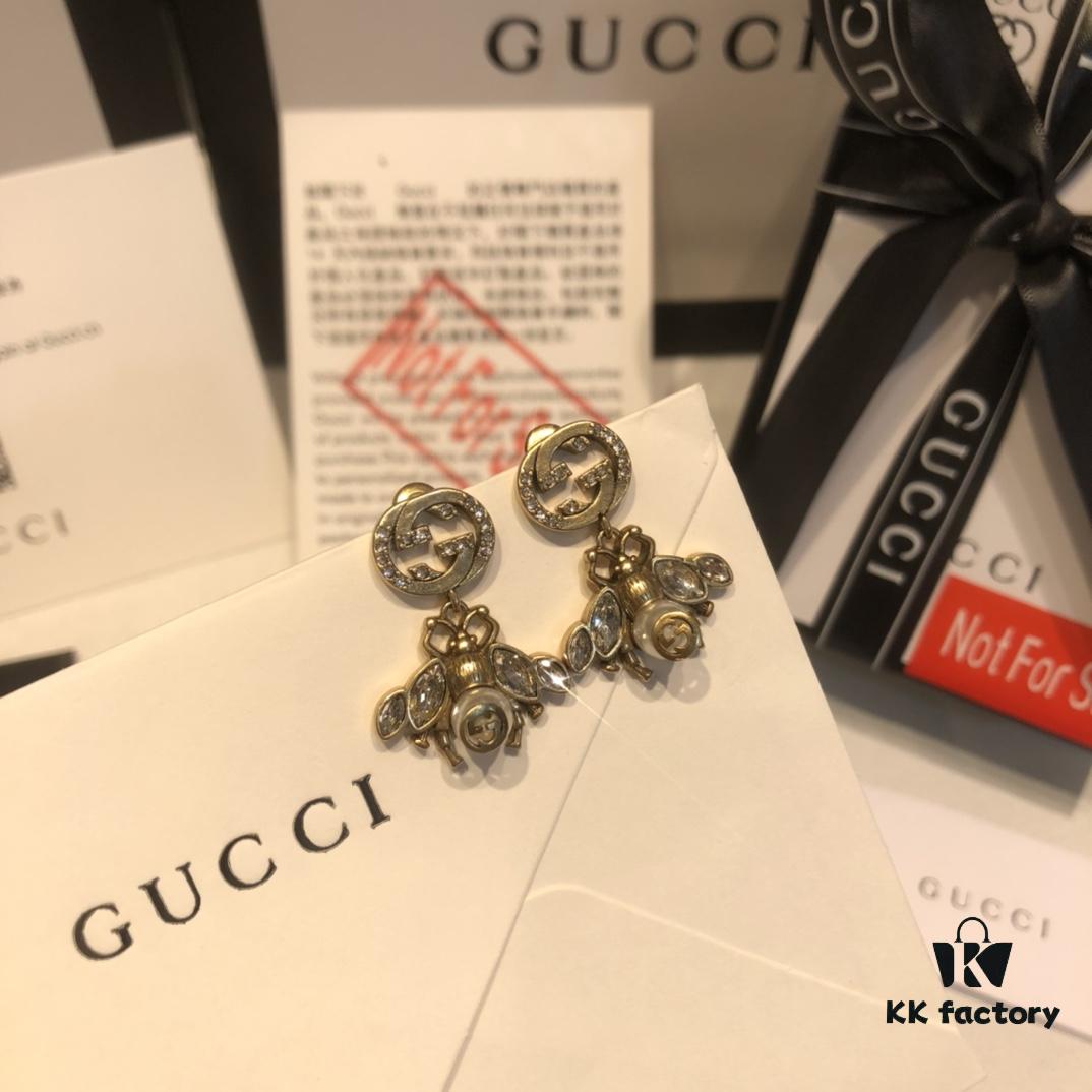 692fef3999f2d84055c8d3c2 GUCCI Diamond-Paved Double G Pearl Bee Stud Earrings