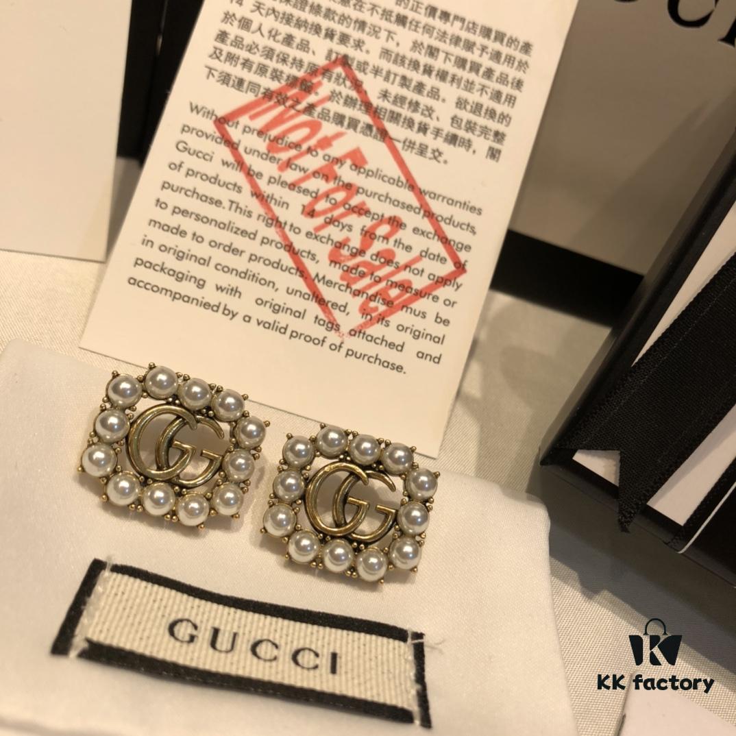 692fef5599f2d84055c8d3ef GUCCI Pearl Double G Stud Earrings