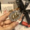 692fef5a99f2d84055c8d3f8 GUCCI Diamond-Accented Double G Sweater Chain