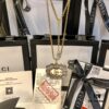 692fef6a99f2d84055c8d409 GUCCI Diamond-Accented Double G Sweater Chain