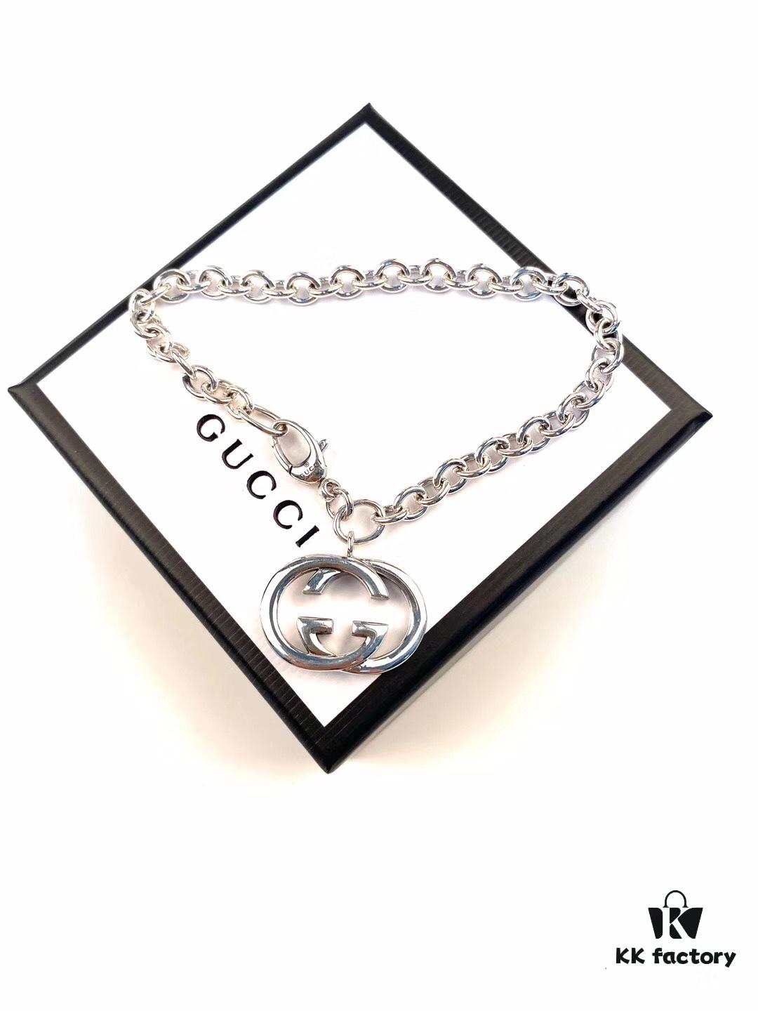 692fef9a99f2d84055c8d482 Gucci Bracelet with Interlocking Double G Pendant, Iconic Symbol of the Spirit, Crafted in Sterling Silver