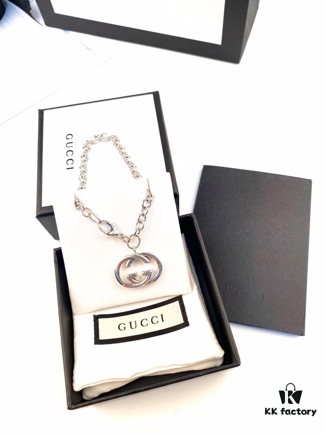 692fef9b99f2d84055c8d483 Gucci Bracelet with Interlocking Double G Pendant, Iconic Symbol of the Spirit, Crafted in Sterling Silver