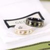 692fefe999f2d84055c8d50c Gucci Icon Series Bee Black Ceramic Couple Ring