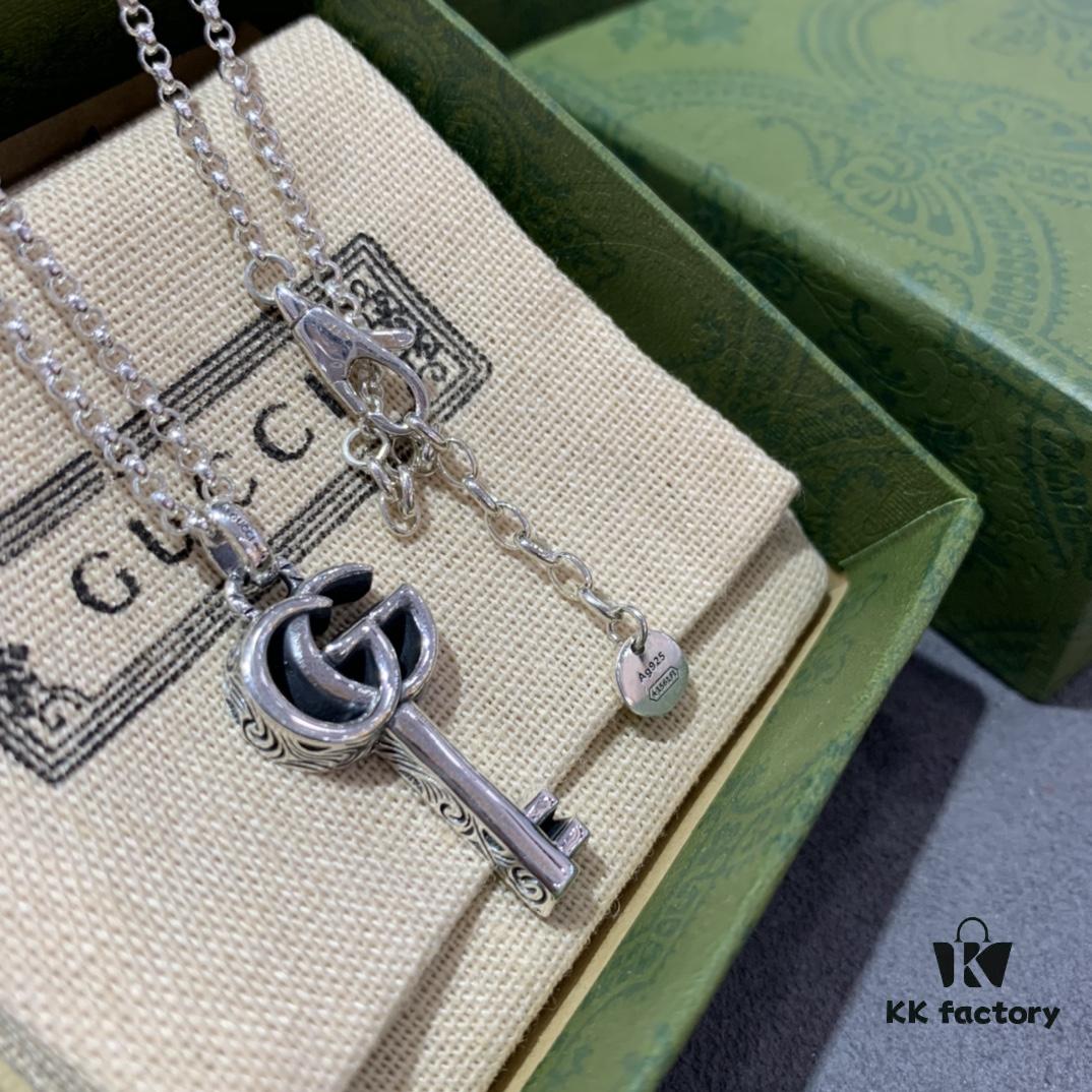 692ff13f99f2d84055c8d783 Winter Essential — Gucci Key Necklace, Silver Pendant for Sweaters